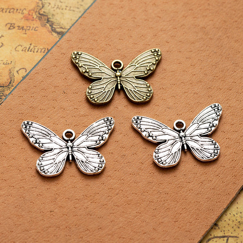 Group view of the detailed butterfly in pictured finishes