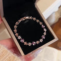 Rose Gold Flower Pearl Clasp Bracelet Purple Crystal Accents view 6