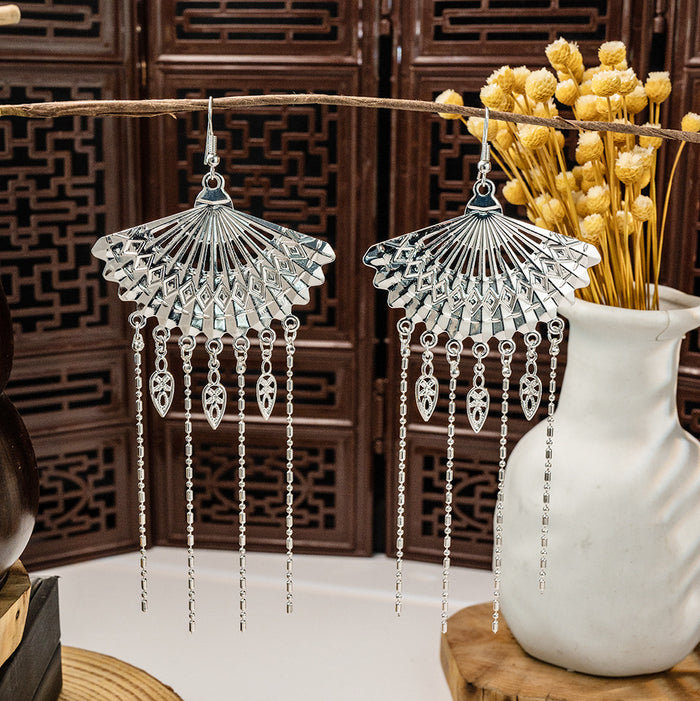 Eighty-Two Silver Tone Ethnic Fringe and Tassel Earrings