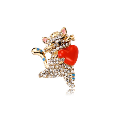 Front product view of the red heart brooch