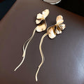 Sculpted Metal Petal and Wavy Stem Long Drop Earrings view 6