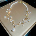 Gold Pearl Teardrop Necklace And Crystal Heart Drop Earrings view 6
