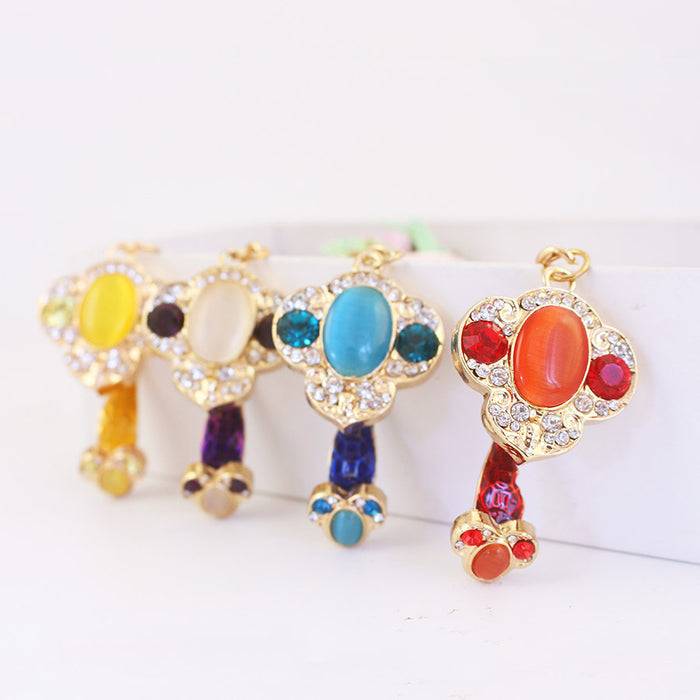 Ruyi-Shaped Metal Keychain With Oval and Faceted Accents