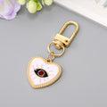 Gold and Silver Tone Multieye Heart Moon Evil Eye Clip Keychains view 3