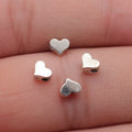 Tiny Heart Spacer Beads in Three Bright Metal Tone Finishes view 6