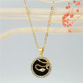 Gold Tone Round Crystal Framed Motif Pendant Necklaces in Nine Designs view 12