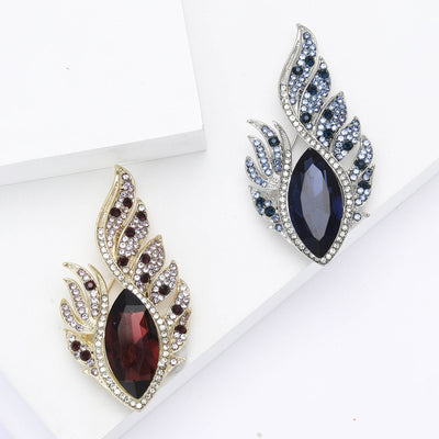 Feather Eye Crystal Brooch With Marquise Center Stone shown from the front on a white background