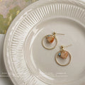 Gold-Tone Open Circle Drop Earrings Peach Faceted Glass Crystal view 1