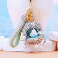 Jeweled Treasure Shell Keychains in Luxury Pearl and Gemstone Orb Styles view 4