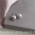 Gray Rose Pearl Like Round Stud Earrings In Five Graduated Sizes view 4