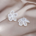 White Crystal Flower Stud Earrings Seed Pearl Petal Edge view 4
