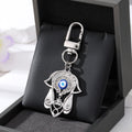 Gold and Silver Tone Crystal Hamsa Hand Evil Eye Clip Keychains in Ten Designs view 8