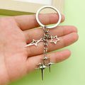 Celestial Charm Keychains Featuring Cross Star Mix Across 15 Pictured Variations view 1