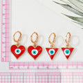 Gold Tone Enamel Heart and Triangle Evil Eye Huggie Drop Earrings view 2
