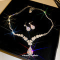 Silver Tone Round Crystal Cluster Necklace And Iridescent Teardrop Earrings view 2