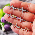 Heartbeat Line Crystal Stud Earrings in Polished Metal view 2