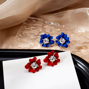 Red Enamel Flower Stud Earrings in Alloy With a Clear Center