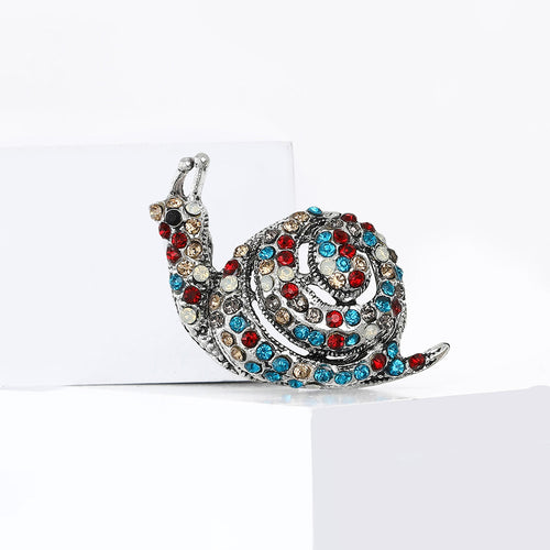 Angled display showing the brooch color and crystal details