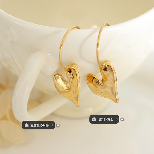 Pair gold hammered heart drops on cup with plating style labels