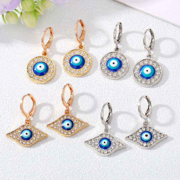 Gold and Silver Tone Crystal Blue Evil Eye Huggie Earrings