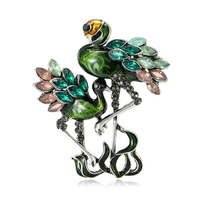 Front product view of the flamingo brooch on a light background