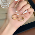 Gold and Silver Irregular Oval Medium Huggie Hoop Earrings view 3