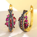 Black and Pink Crystal Leaf Huggie Earrings in Gold Tone view 3