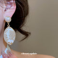 White Oval Leaf and Pearl Drop Earrings in Gold Tone view 3