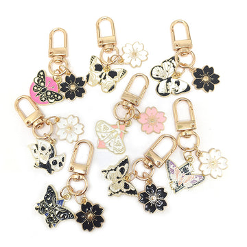 Gold Tone Butterfly Skull and Cherry Blossom Clip Keychains