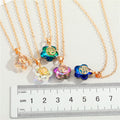 Gold Tone Flower Crystal Tree of Life Pendant Necklaces in Five Colors view 2