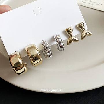 Twisted C Hoop Earrings in Mixed Gold and Silver Tones