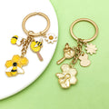 Bee and Honeycomb Charm Keychains Featuring Yellow Daisy Across 33 Pictured Variations view 3