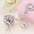 Hollow Palace Bell Keychains in Gold and Silver Tone Finishes view 7