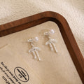 Silver Bow Pearl Look Open Ribbon Dangle Stud Earrings view 2