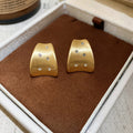 Wide Brushed Hoop Earrings In Gold And Silver Tones view 7