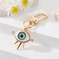 Gold Tone Sculpted Sun and Lash Realistic Eye Clip Keychains view 7