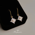 Gold Starburst Flower Crystal Drop Earrings Clear CZ view 1