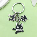 Black Cat With Knife And Paw Print Metal Keychain, Three Charms view 1