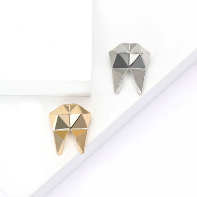 Geometric Molar Tooth brooch shown from the front
