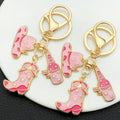 Pink Western Hat Boot Bottle and Star Metal Keychain Set view 2