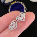 Silver Tone Heart Stud Earrings Open Center Clear Stones view 1
