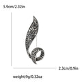Curved Crystal Leaf Brooch In Black And Multicolor Finishes view 5