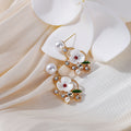 White Flower Pearl Look Green Leaf Gold Stud Earrings view 4