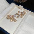 Gold Tone Bow and Pearl Stud Earrings in Three Designs view 6