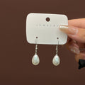 White Pearl Look Teardrop Small Silver Hook Earrings view 2