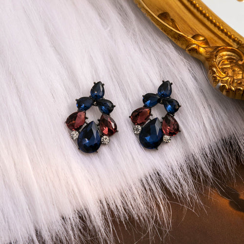Navy and burgundy mixed rhinestone geometric cluster studs on white fur