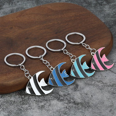 Four striped tropical fish keychains in assorted colors