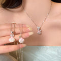 Pink Shell Pendant Necklaces with Silver Tone Ocean Charms in Three Styles view 1