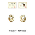 Gold Twisted Swirl Stud Earrings Crystal Arc Open Center view 3