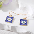 Gold Tone Blue Enamel Evil Eye Necklace and Hook Earring Options view 3